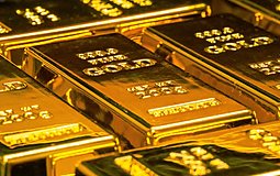 黄金收涨后早盘回落,美联储暂停未消除利率约束